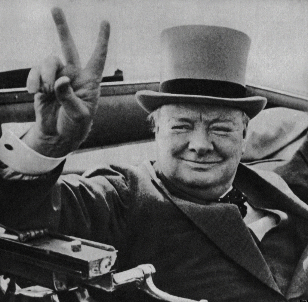 British wartime leader Winston Churchill with his famous V for victory ...